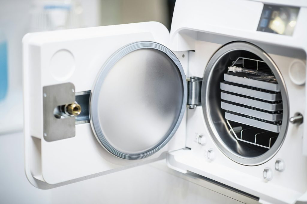 Autoclave in Dentist Office. Dental Infection Control and Sterilization